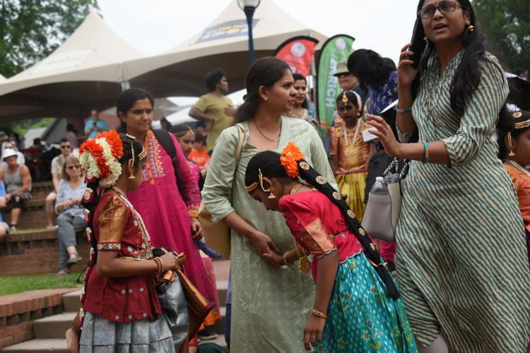 Parissa Shabbir, left, and Raisa Fahreen perform a dance as part of the Asia on the Creek in Frederick in 2023.